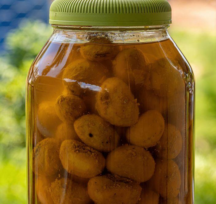 Conserva de caroços de pequi em óleo