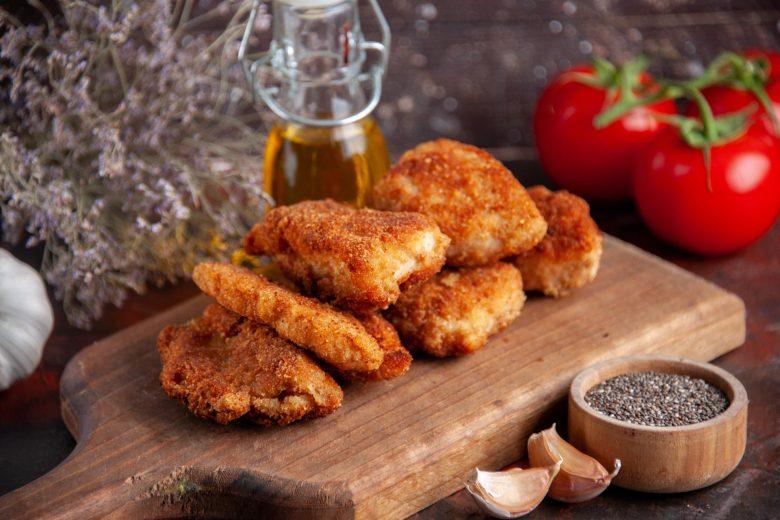 Asa de frango empanada com páprica