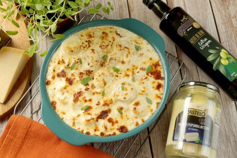 Nhoque gratinado com palmito e parmesão