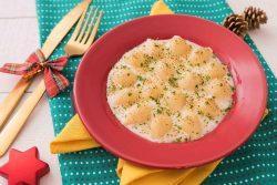 Búzio ao molho de queijos gratinados